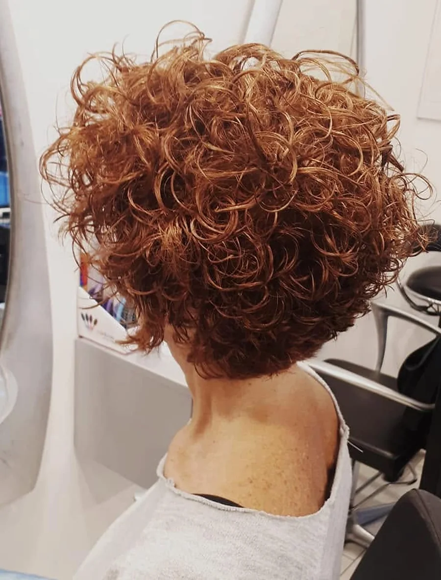 Taglio riccio ramato realizzato da Cristina Hair Style